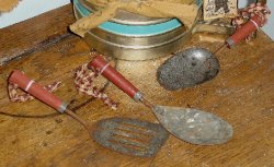 Rusty tin utensil ornies spatula spoon.jpg