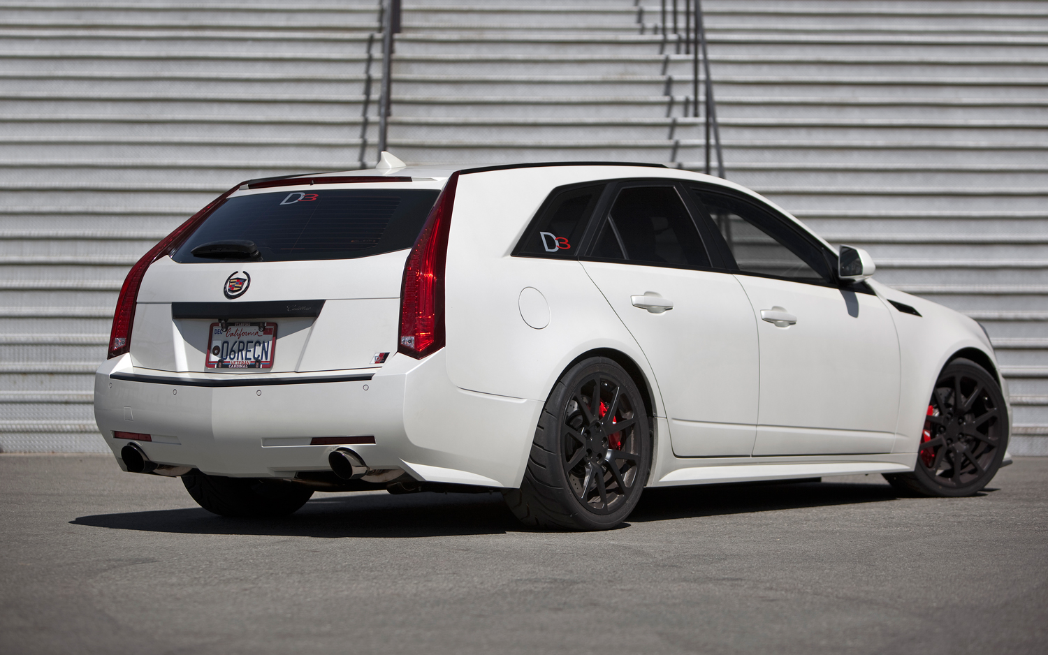 d3-cadillac-cts-v-wagon-rear-three-quarters.jpg