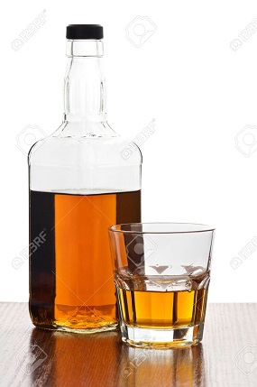 10020596-whiskey-bottle-with-glass-isolated-Stock-Photo.jpg