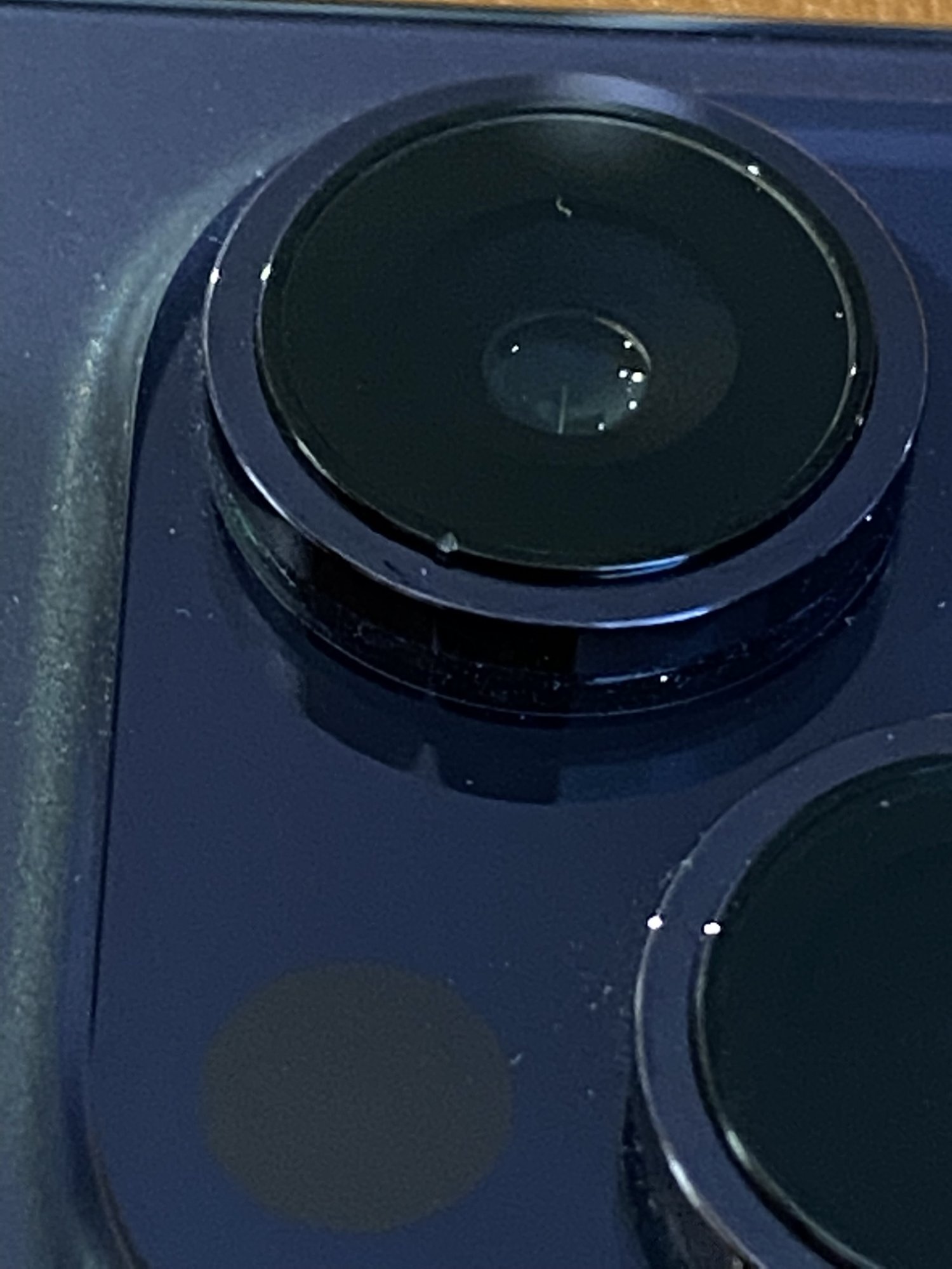 iphone 14 pro camera lens cracked - how easily fixable is this
