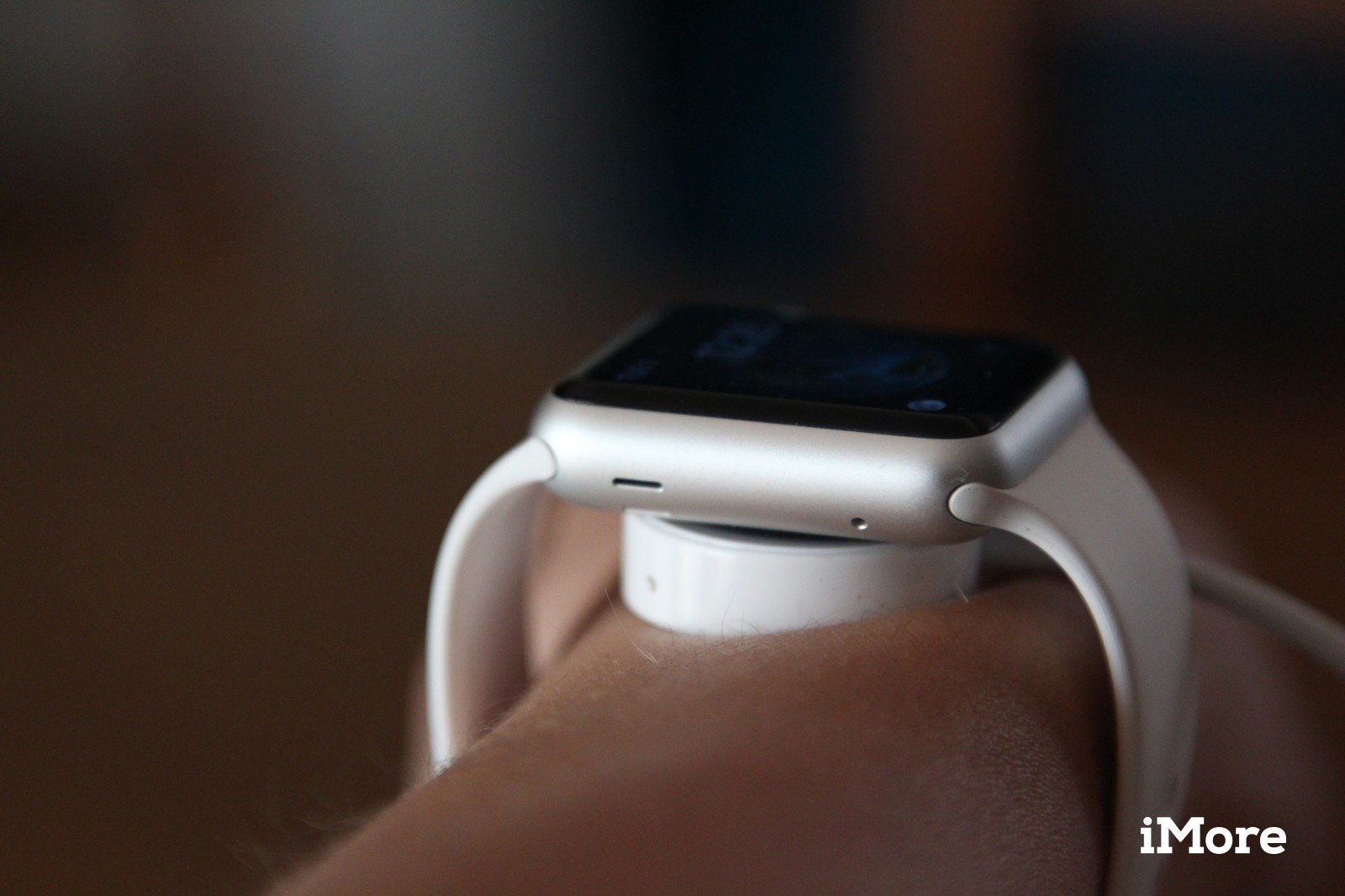 apple-watch-charging-on-wrist-hero.JPG