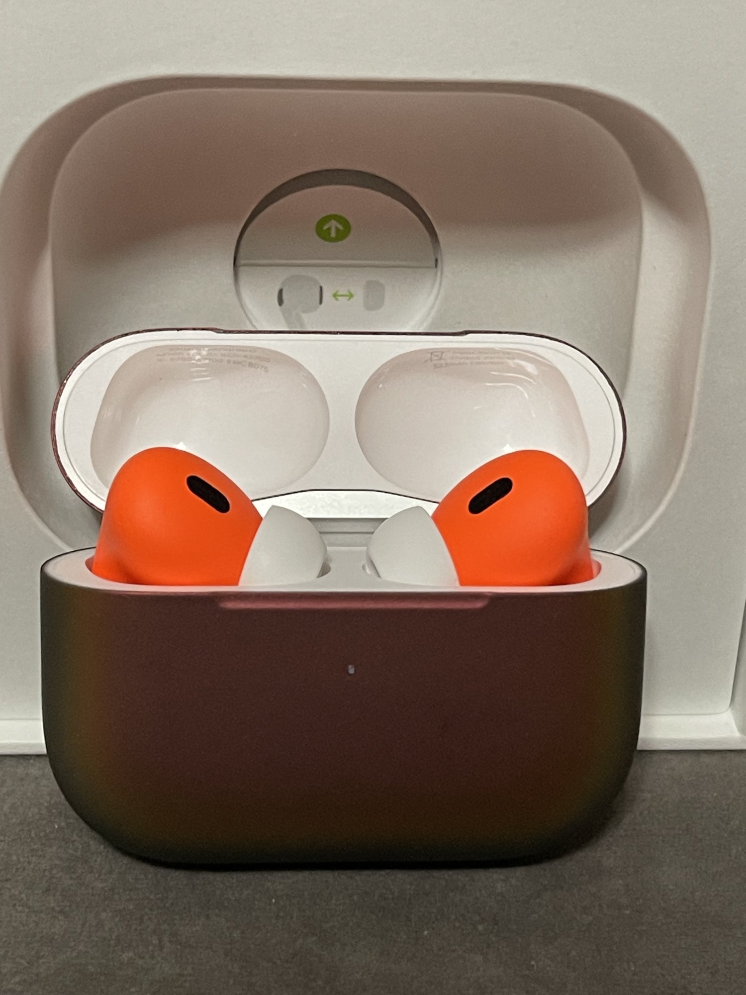 Blaze Orange AirPods.jpeg