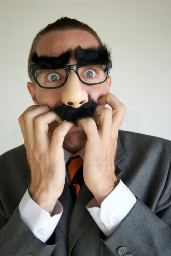 businessman-in-disguise-looks-scared-picture-id172999707-1149475409.jpeg