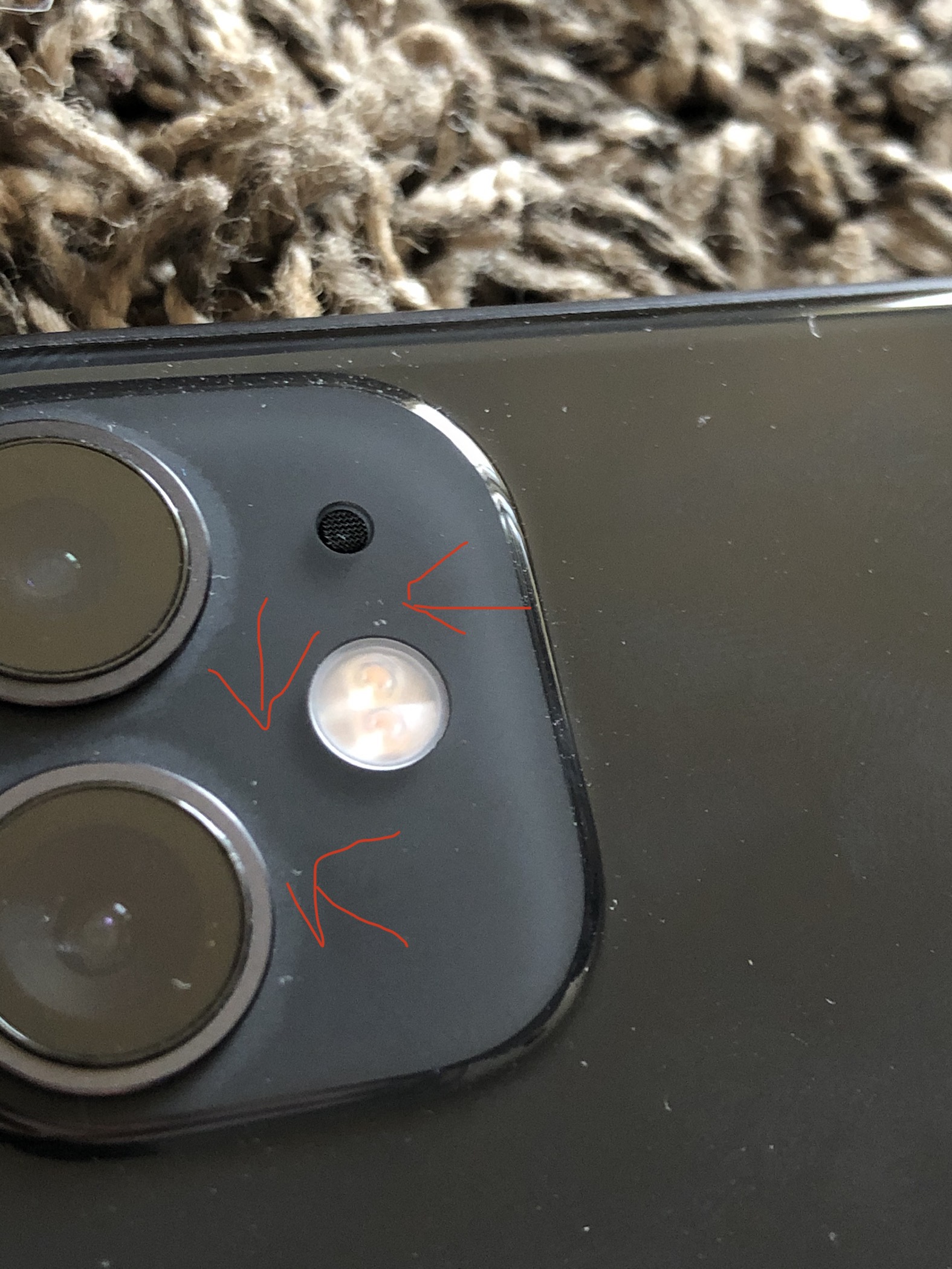 Does iPhone 11 camera lens scratch?