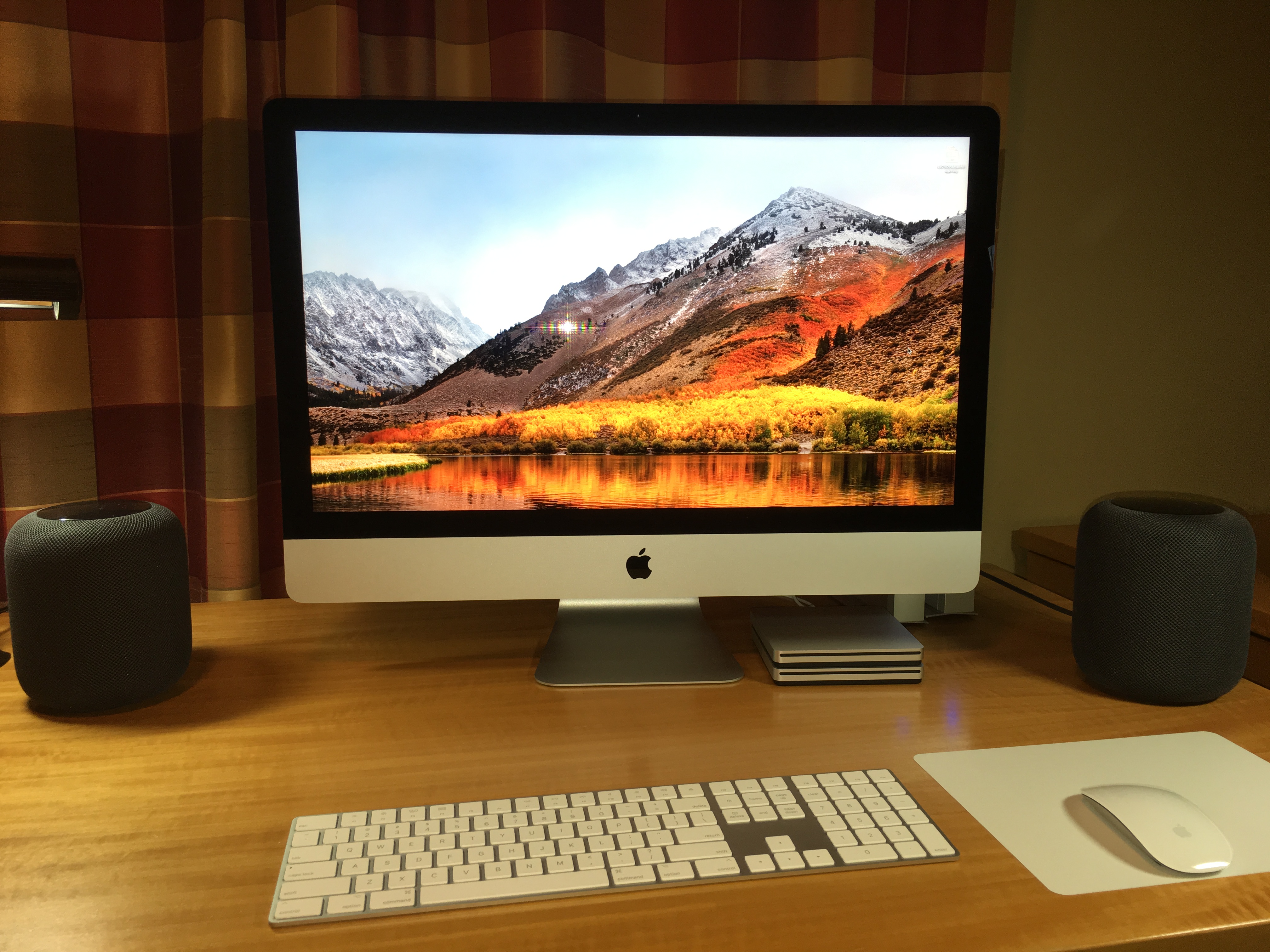 iMac with black HomePods.JPG
