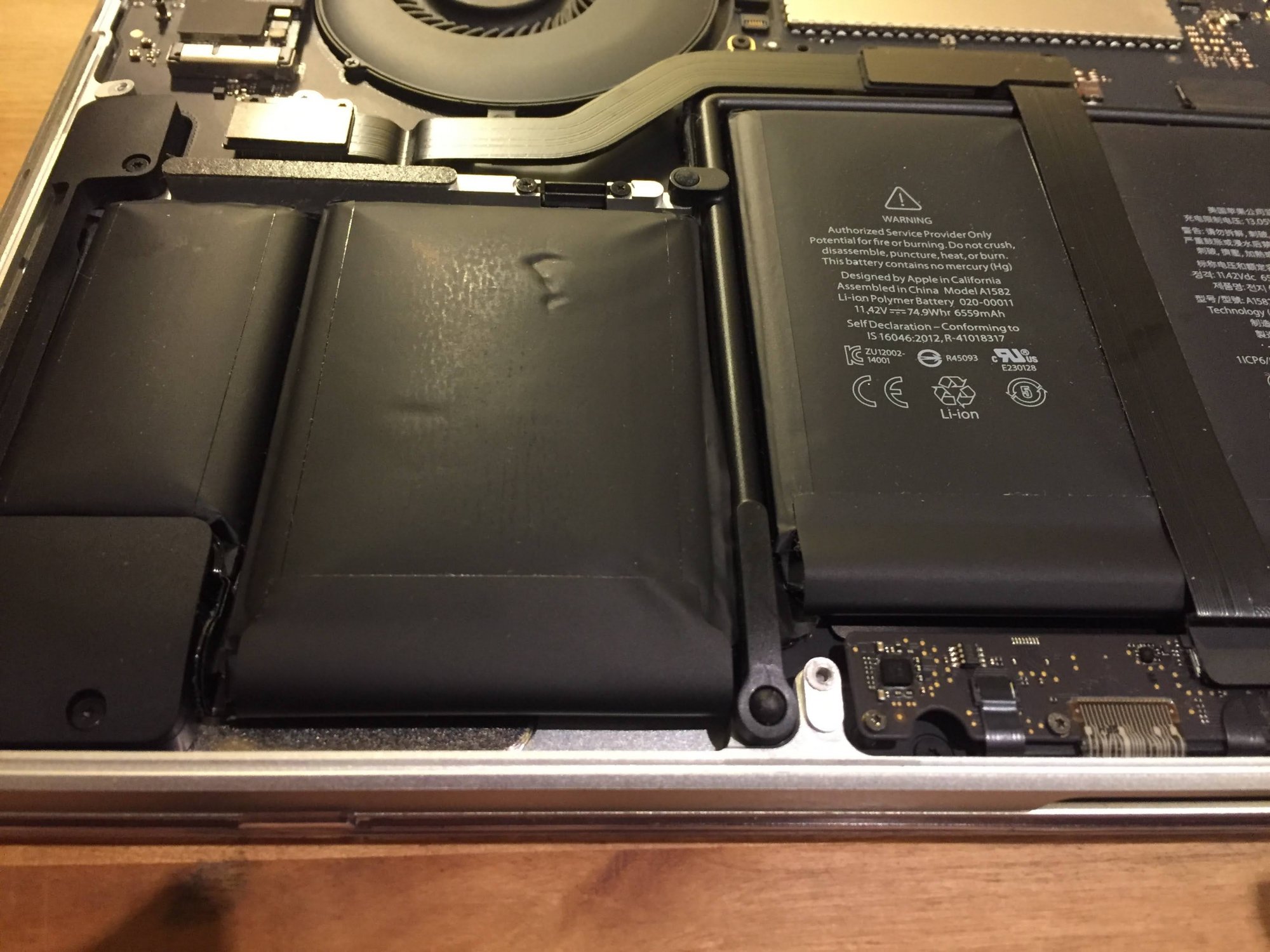 Swollen Battery Macbook Pro 13 Early 15 Free Apple Repair Macrumors Forums