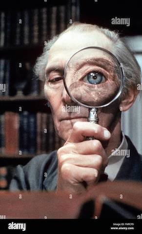 peter-cushing-with-magnifying-glass-top-secret!-1984-FHPCP9.jpg