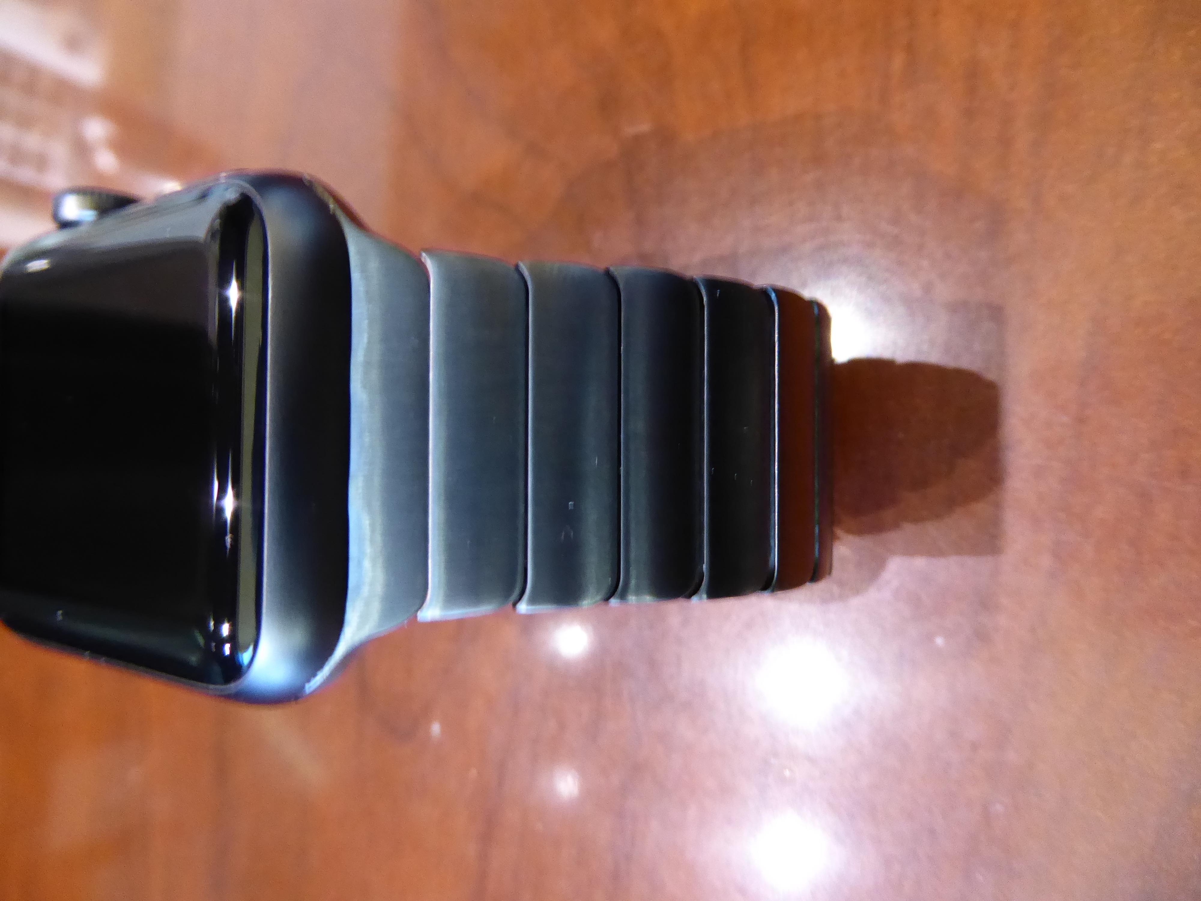 space grey watch with silver band