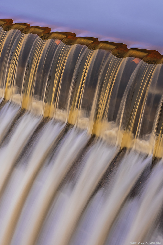 WinterWaterFlowOverFloodgate.jpg