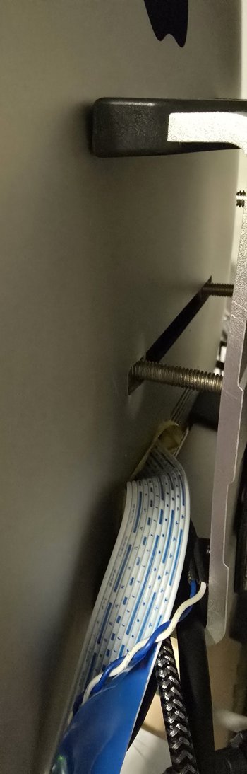 iMac - detail on the two bolts through the slot for the original stand, and view of the cablin...jpg iMac - detail on the two bolts through the slot for the original stand, and view of the cablin...jpg