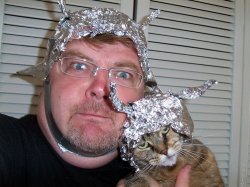 tin foil hats on guy and cat.jpg