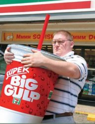 people-are-strange-fat-man-coming-out-of-seven-eleven-with-a-super-gulp-as-big-as-he-is.jpg