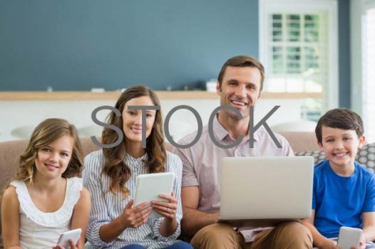 smiling-family-using-digital-tablet-phone-laptop-living-room-home_107420-61806.jpg