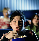 boy eating popcorn.jpg