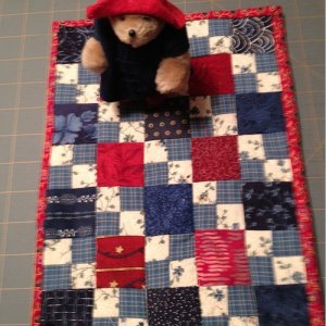 Paddington Bear checks out quilt.jpg