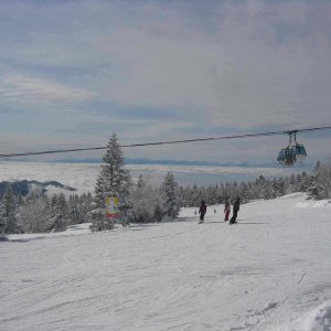 SkiingAboveClouds.jpg