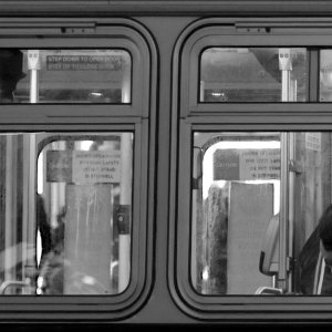 Man Sitting on MUNI bus in San Francisco.jpg