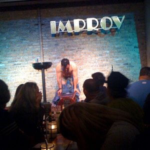 carlos mencia bends over.jpg