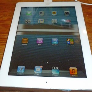 Ipad 3 with apps and block out.JPG