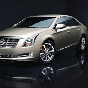 2014_cadillac_xts_f34_ns_70114_600.jpg