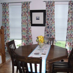 Front room with octagon table and chairs.jpg