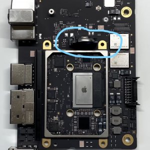 M1 Mac mini logic board with battery.jpg
