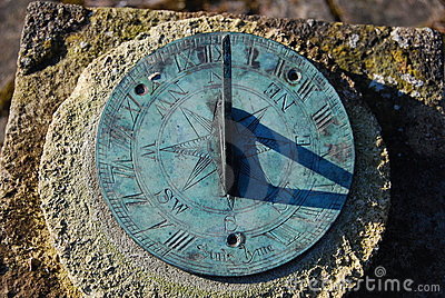 close-up-old-sundial-shadow-8333823-1.jpg