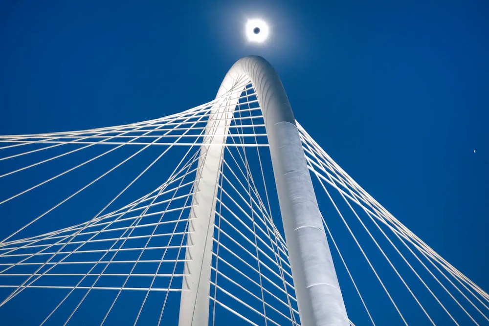 eclipse over the Margaret Hunt Hill Bridge.jpg