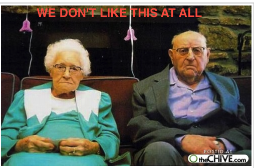 Frowning old couple.png