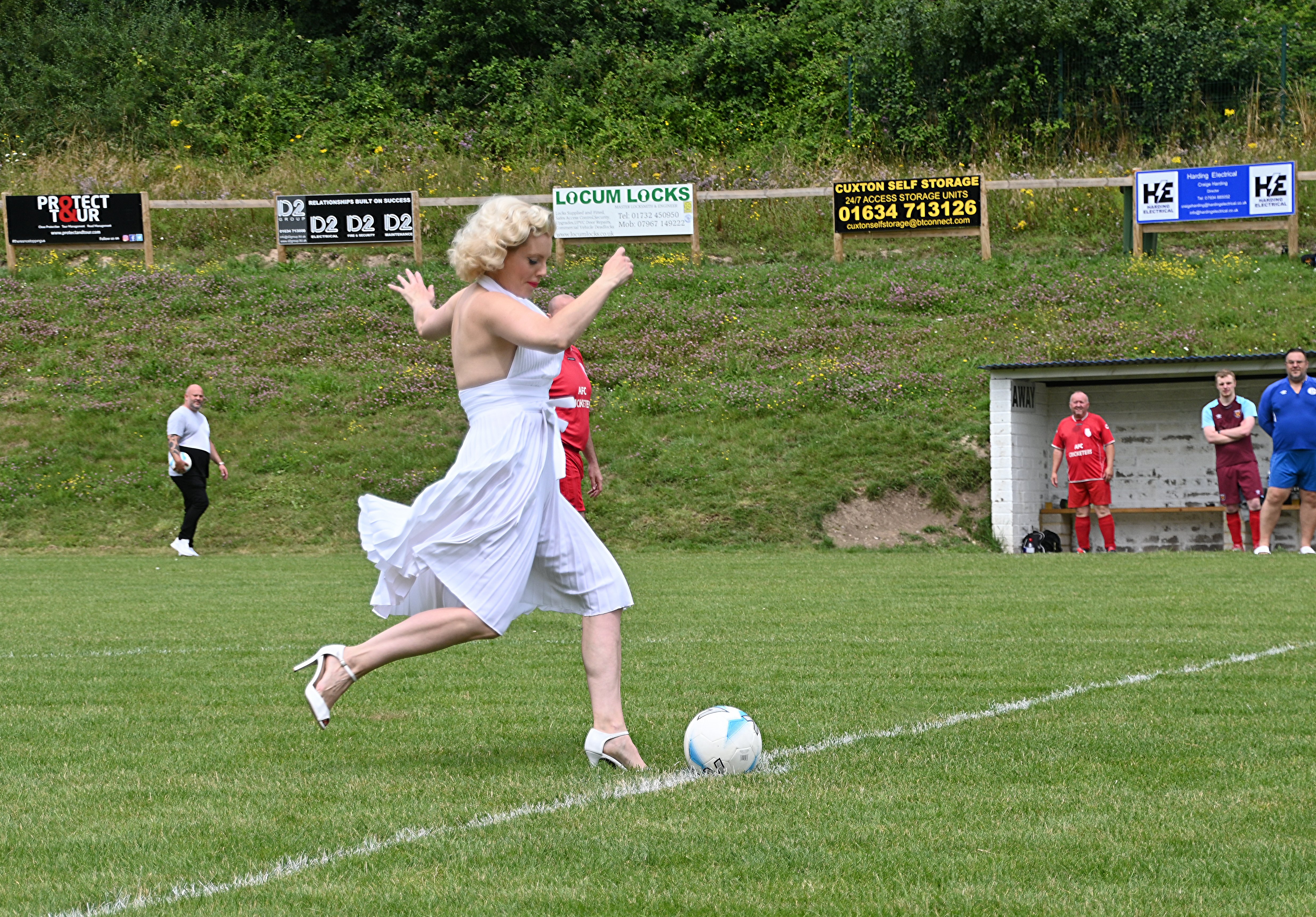 Marilyn Kicks Off.JPG
