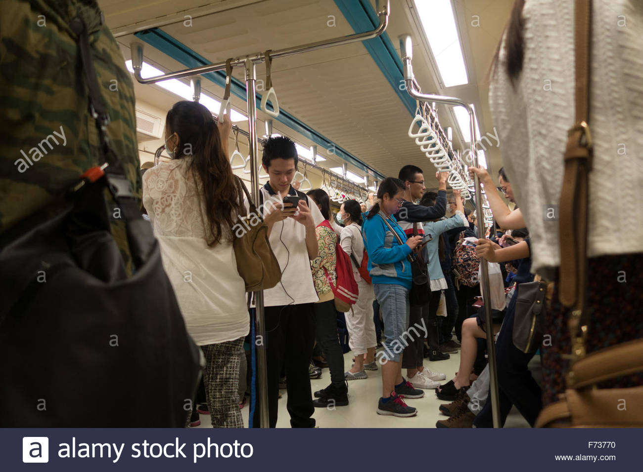 people-inside-taipei-subway-train-f73770.jpg