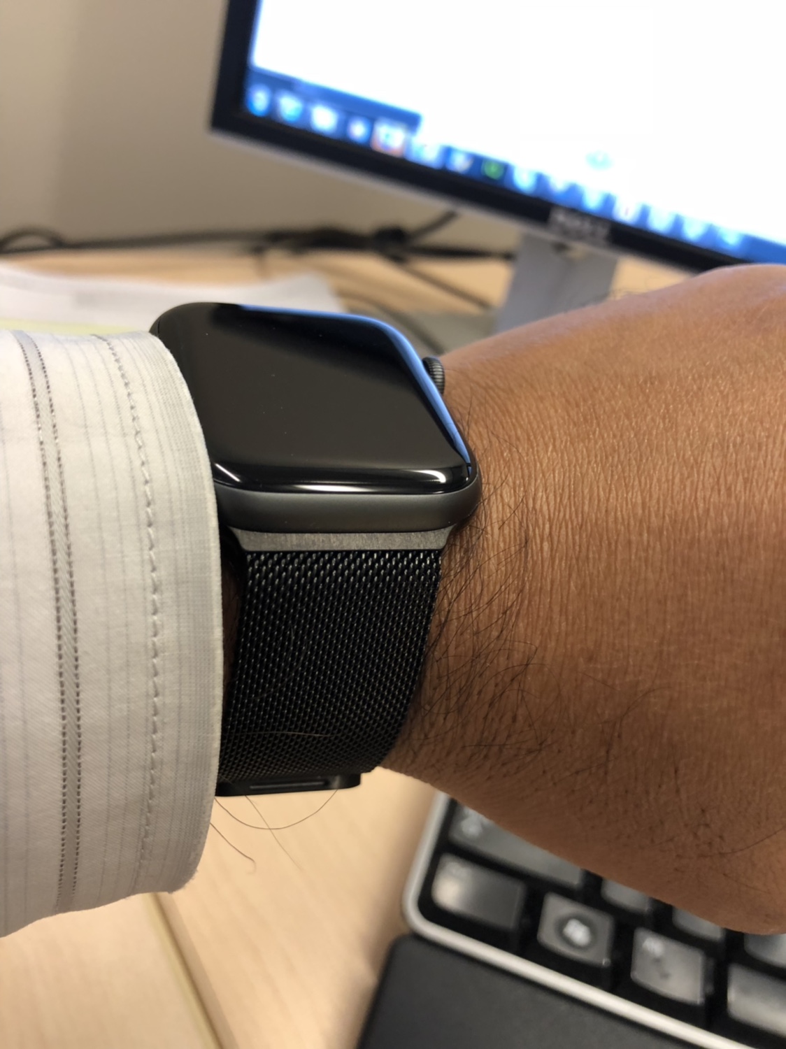space grey watch with white band