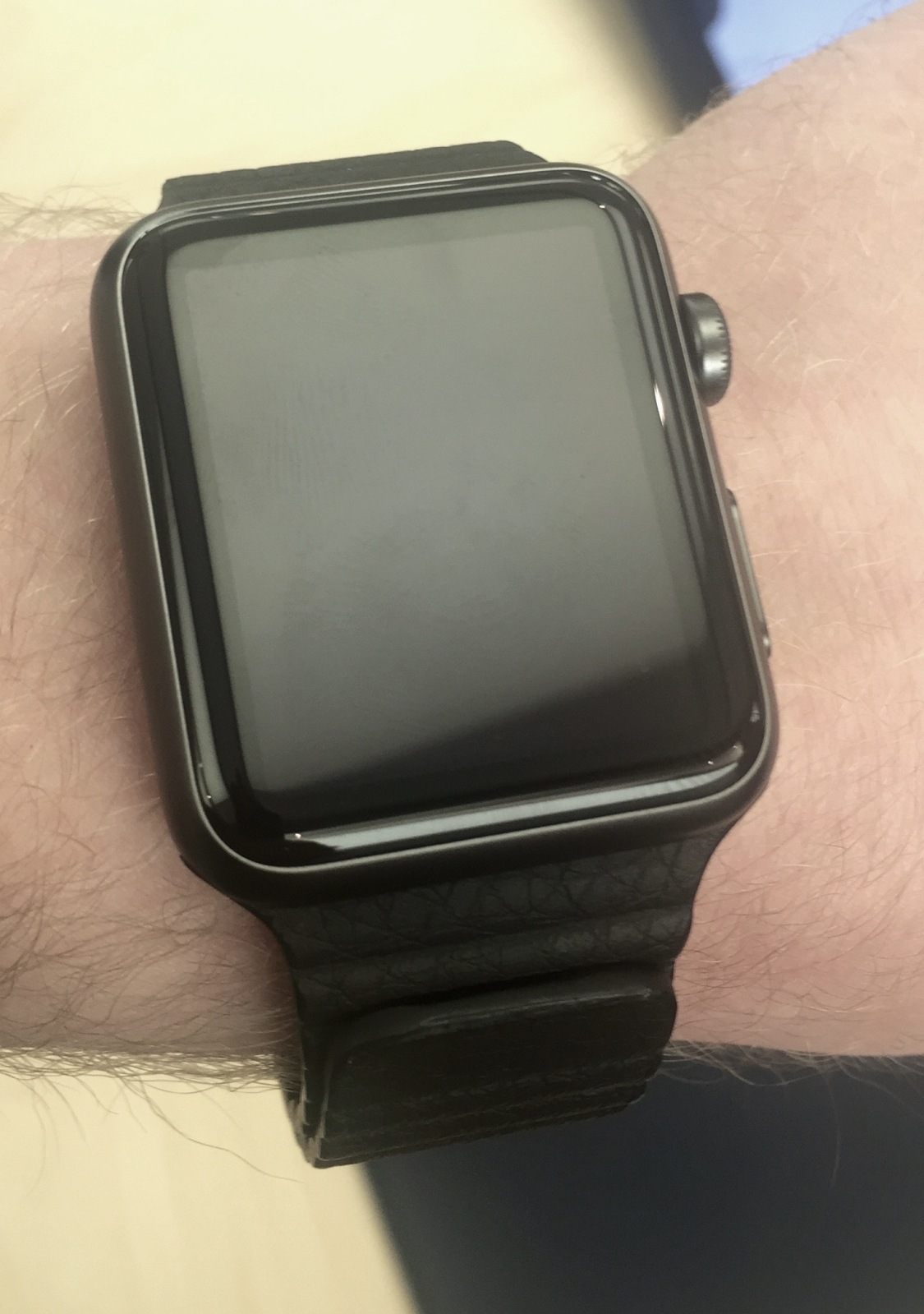 space gray watch with silver band