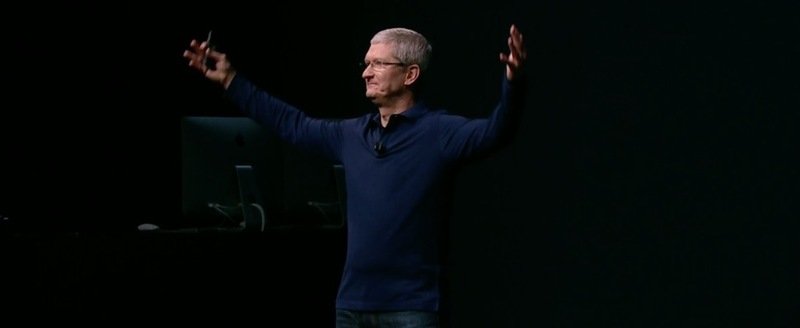 tim_cook_hands_raised.jpg