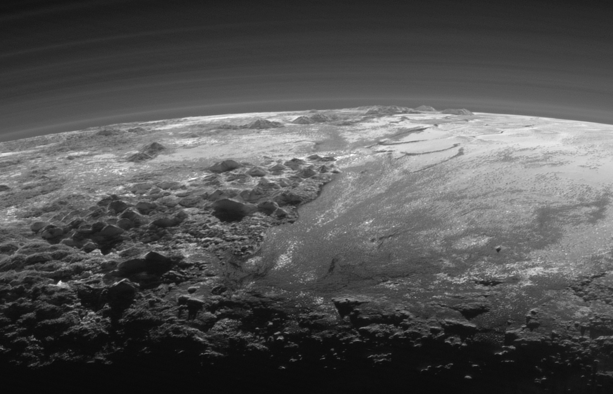 nh-apluto-mountains-plains-9-17-15_0.png