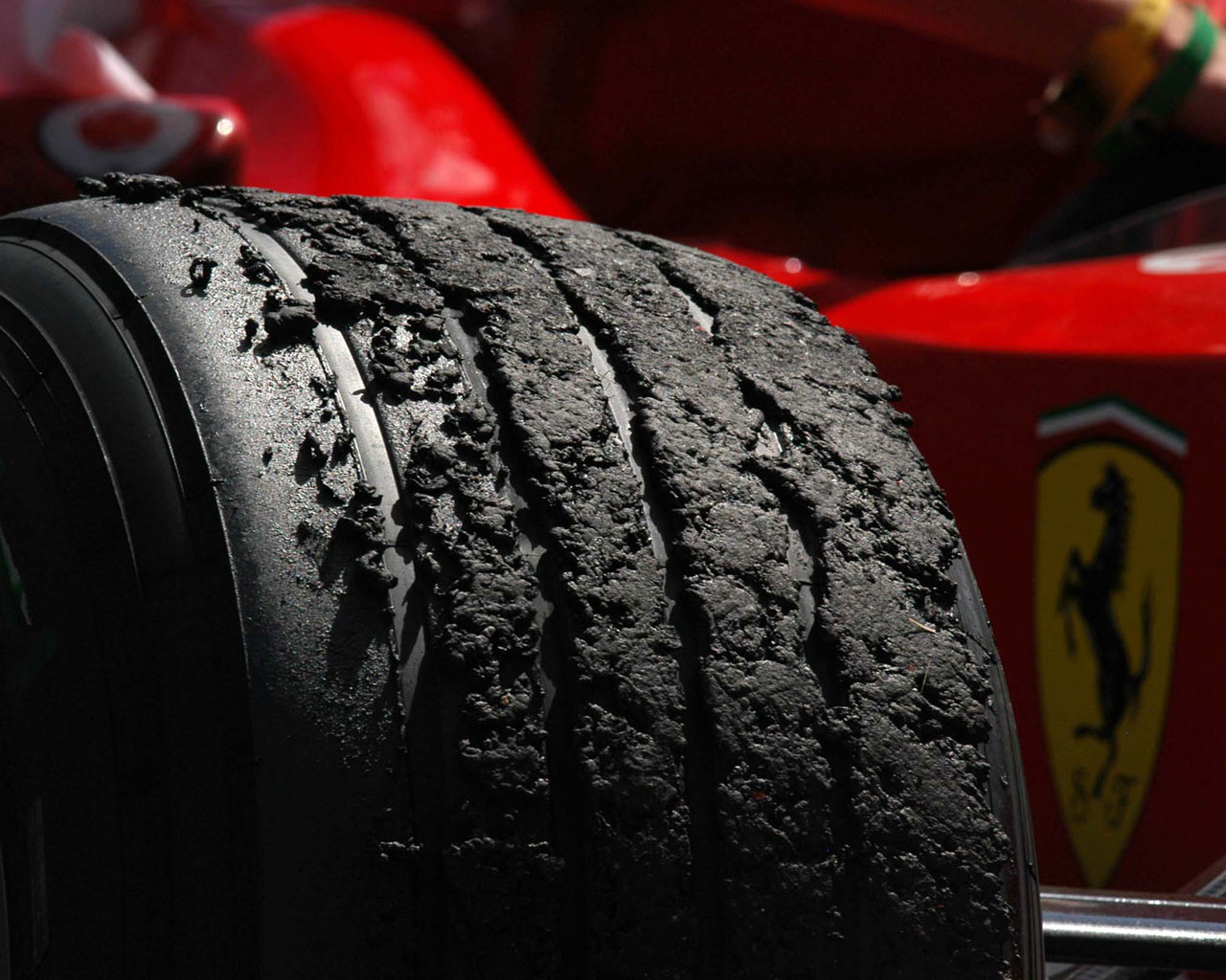 f1-ferrari-shredded-tire.jpg