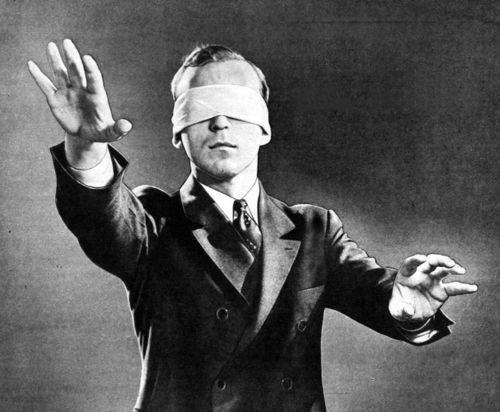 searching-blindfolded-man.jpg