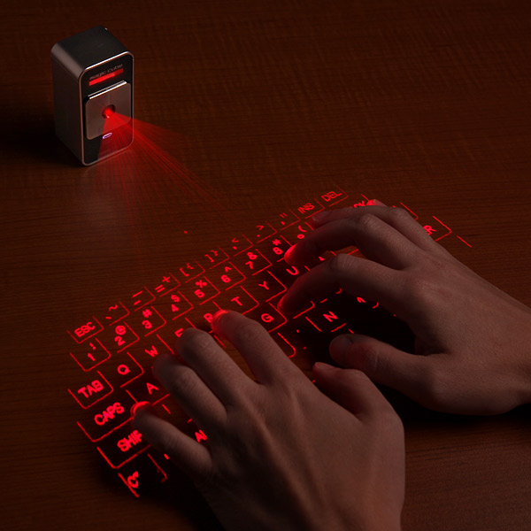 e722_cube_laser_virtual_keyboard_for_iphone_inuse.jpg