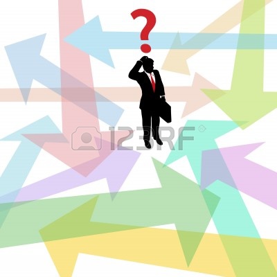 9616790-business-person-standing-in-confusing-arrows-makes-decision-to-answer-question.jpg