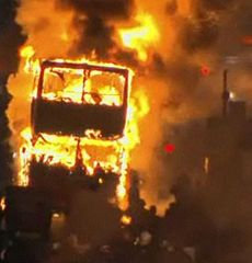 230px-Double-deck_burning_in_2011_england_riots.jpg